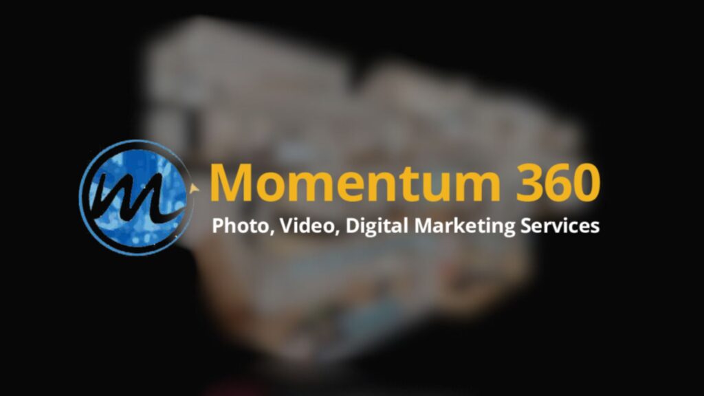 A blurred background with a blue circular logo featuring an "M" and the text "Momentum 360 Photo, Video, Digital Marketing Services" in yellow.